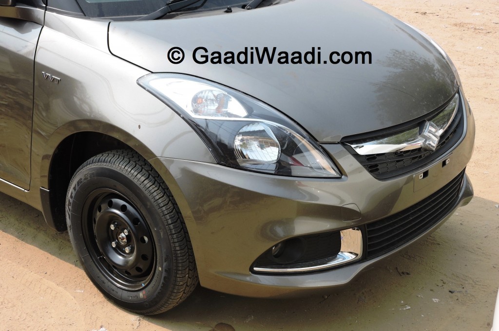 swift-dzire-facelift-2015-grey-side-front