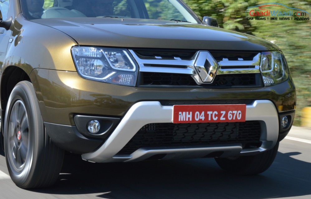 Hawk eye cluster headlamps with Single piece front grille in new renault duster