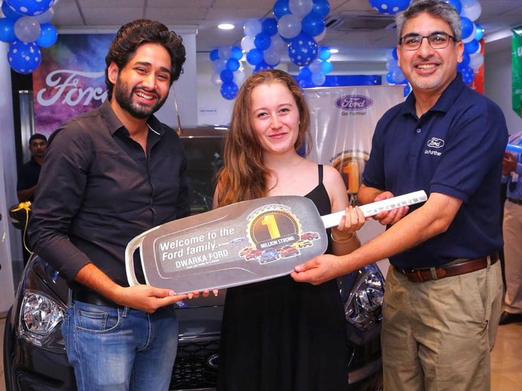 Anurag Mehrotra, President & MD, Ford India handing over Ford Freestyle to Ford's One Millionth Indian Customer - Nikhil and Alexandra Kakkar
