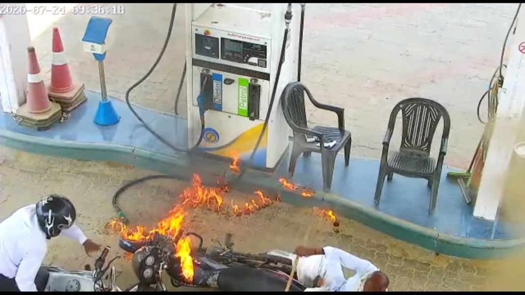 motorcycle catches fire at petrol pump