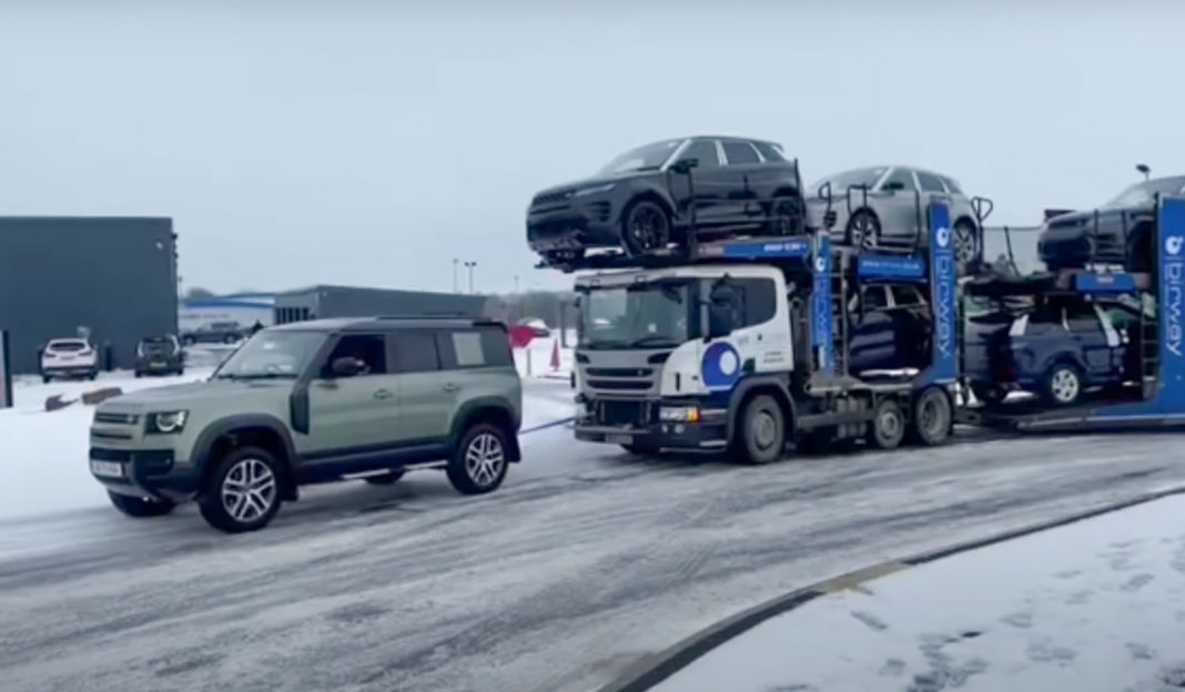 New Land Rover Defender Pulls Car Trailer